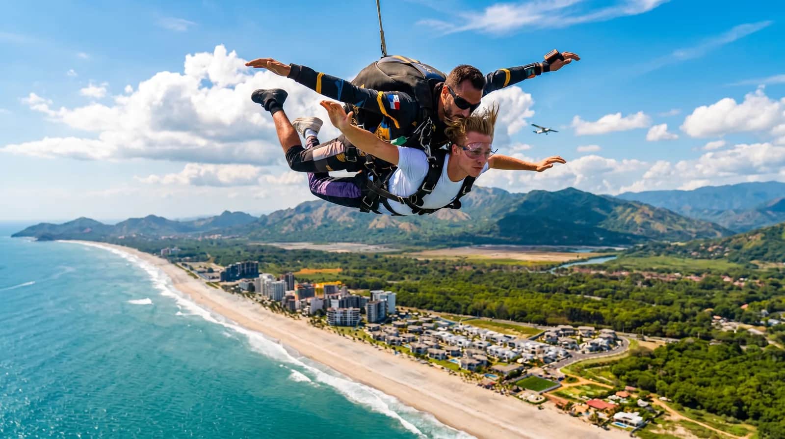 Tandem skydive over the Playa Caracol coastline